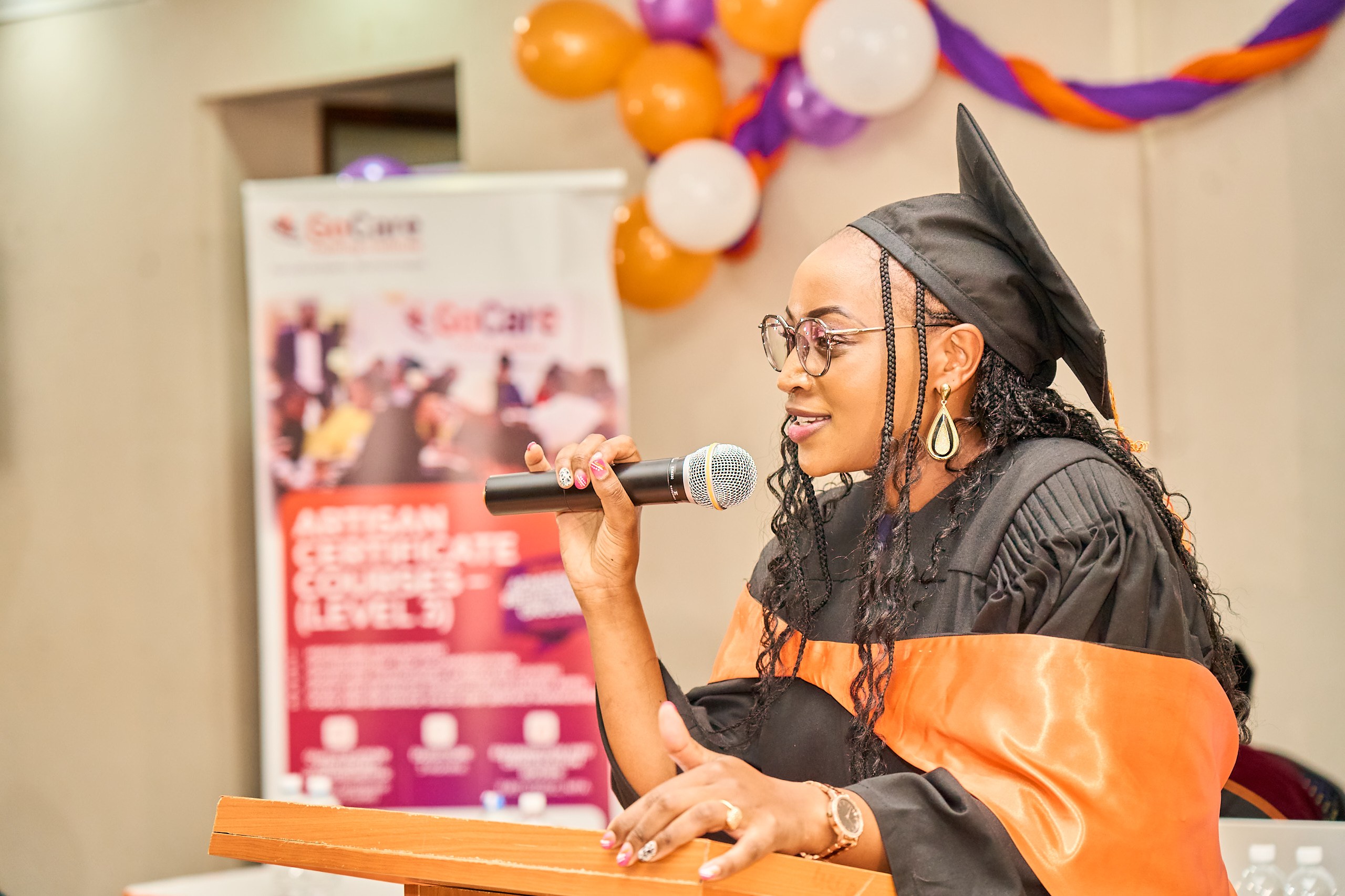 Graduate speaking at ceremony