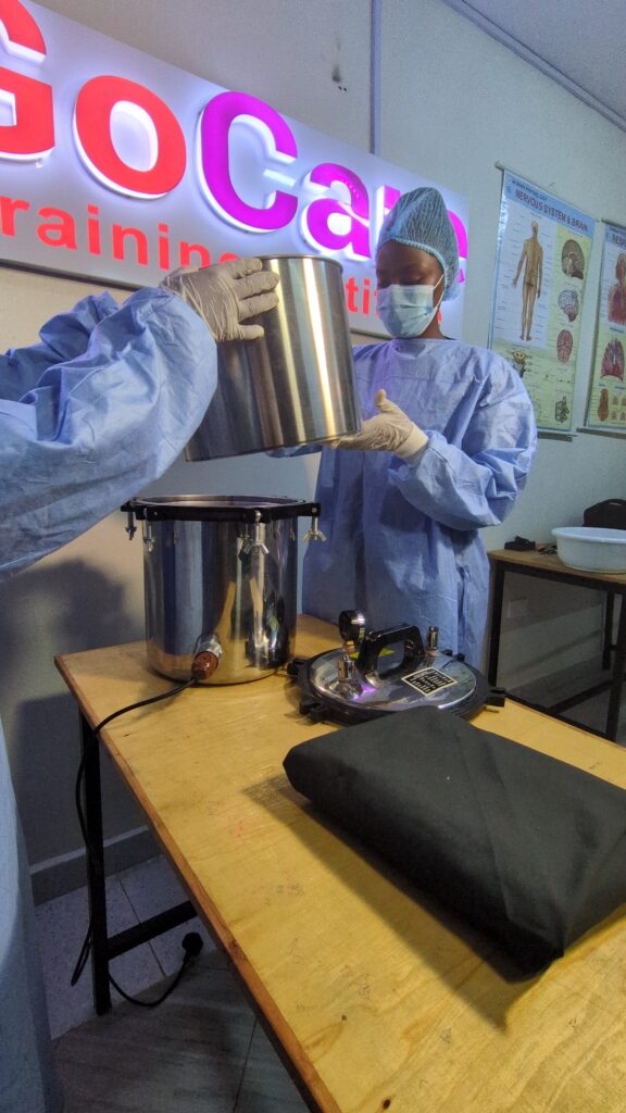 Perioperative Theatre Technology students sterilizing instruments.
