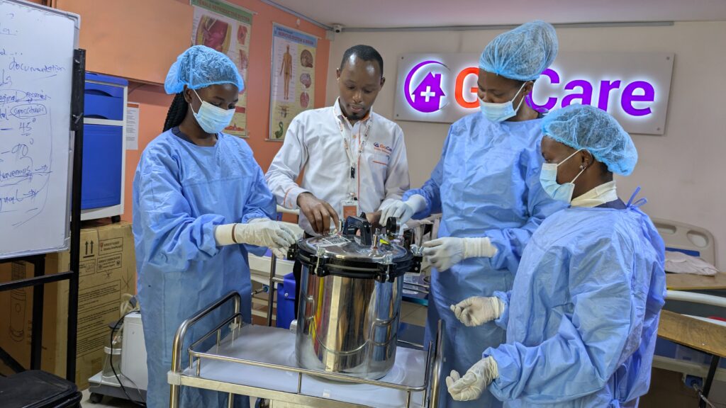 GoCare students in skills lab training autoclave